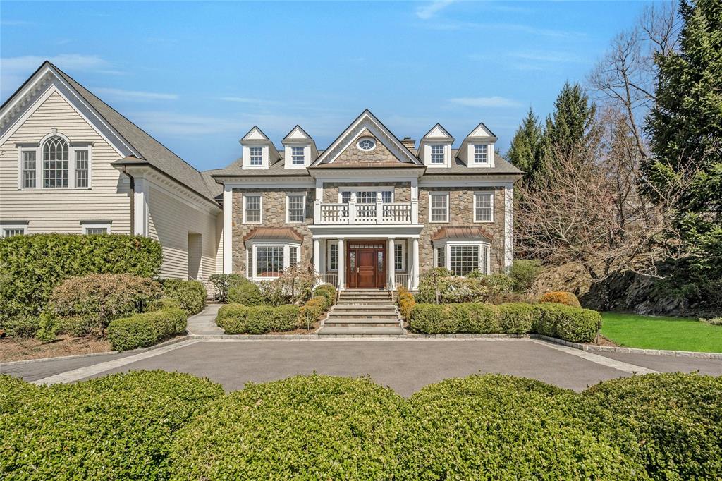 Front view of a large luxury home in Harrison, NY