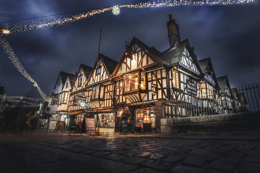 A winter village scene with twinkling lights.